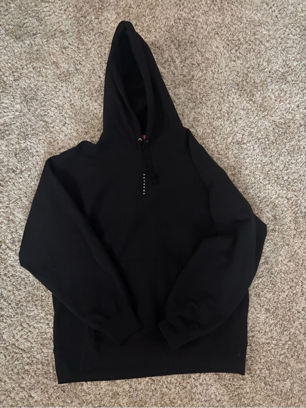 Supreme Black Hoodie with Subtle Logo